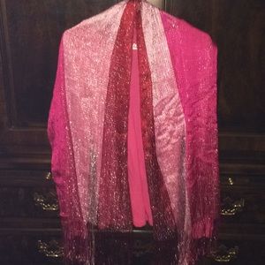 Beautiful red, fuschia, and pink fringed scarf.